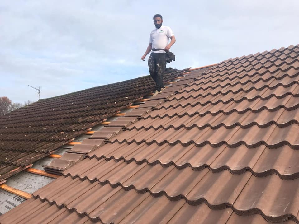 Professional roofers working on a property in London - KS Roof Master