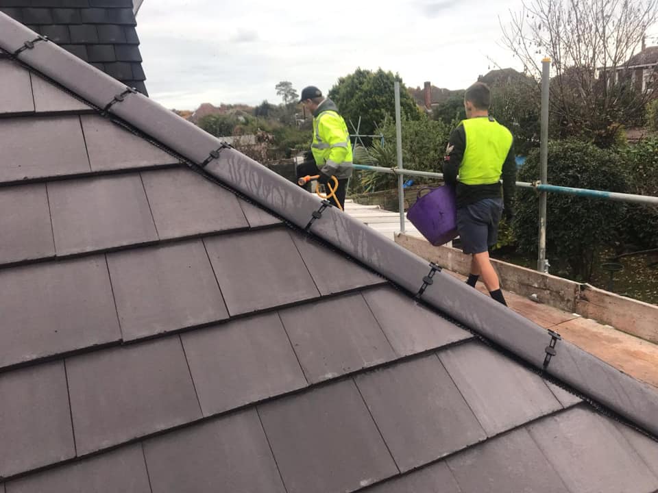 Professional roofers working on a property in London - KS Roof Master