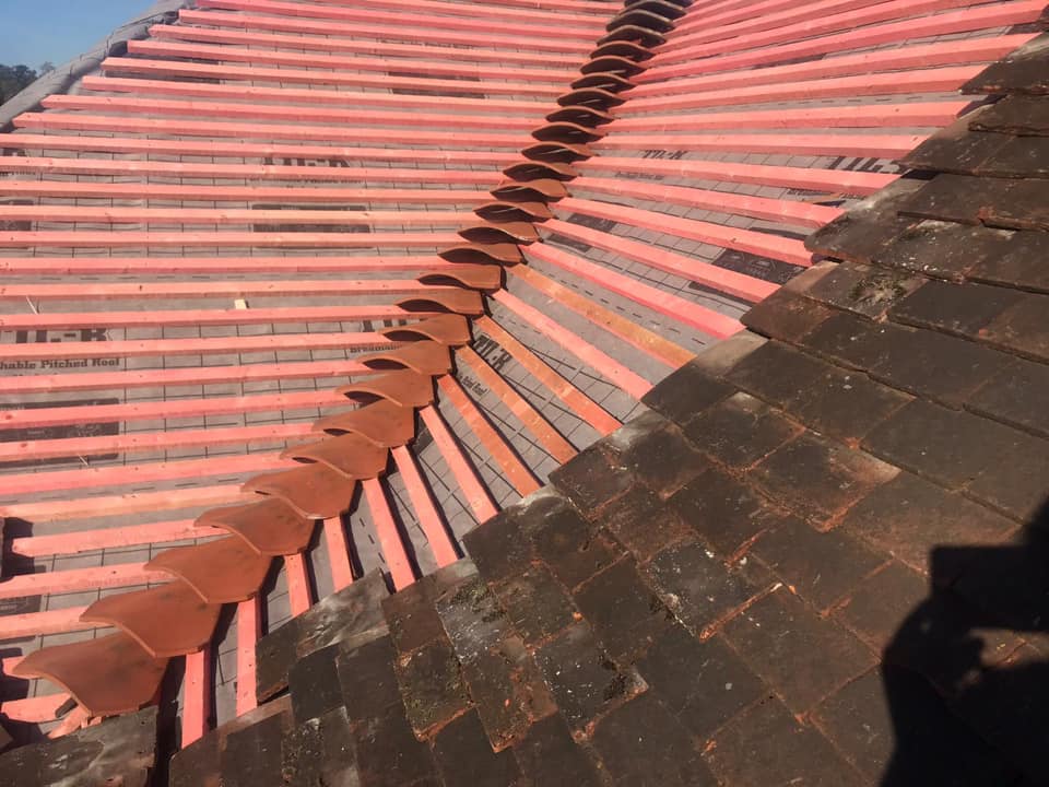 Professional roofers working on a property in London - KS Roof Master