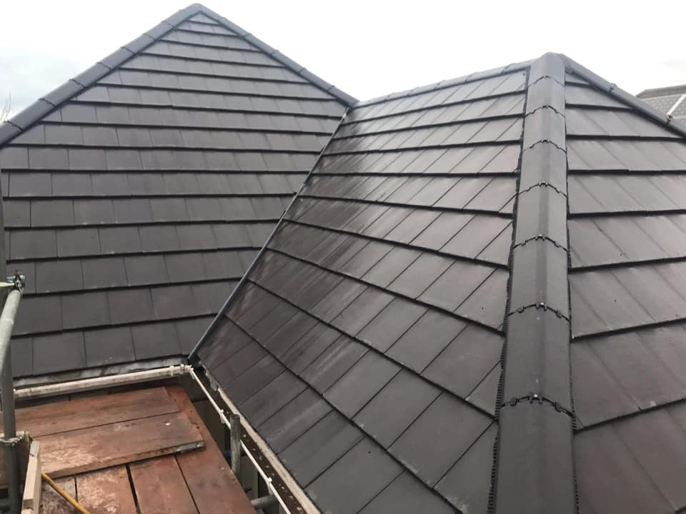 Professional roofers working on a property in London - KS Roof Master