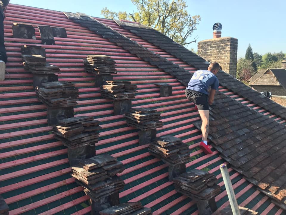 Professional roofers working on a property in London - KS Roof Master