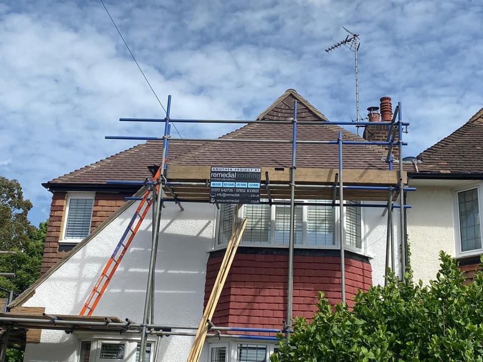 Professional roofers working on a property in London - KS Roof Master