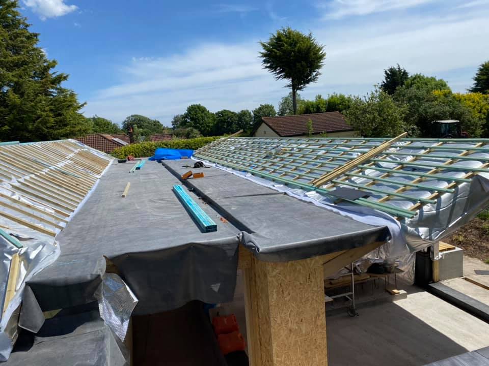 Professional roofers working on a property in London - KS Roof Master