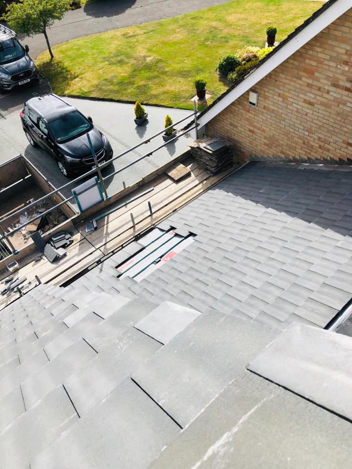 Professional roofers working on a property in London - KS Roof Master