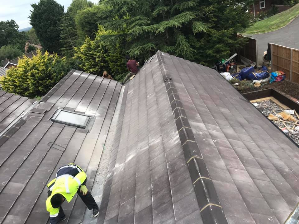 Professional roofers working on a property in London - KS Roof Master