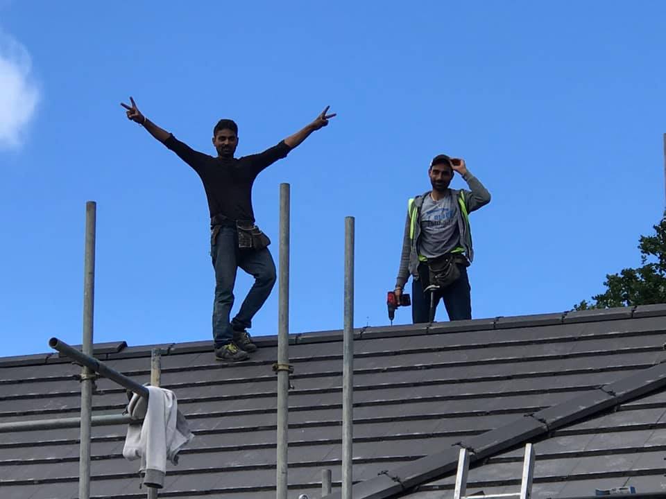 Professional roofers working on a property in London - KS Roof Master