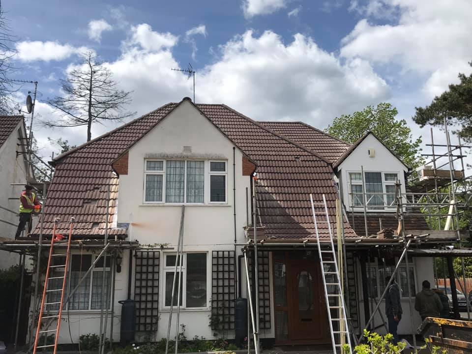 Professional roofers working on a property in London - KS Roof Master