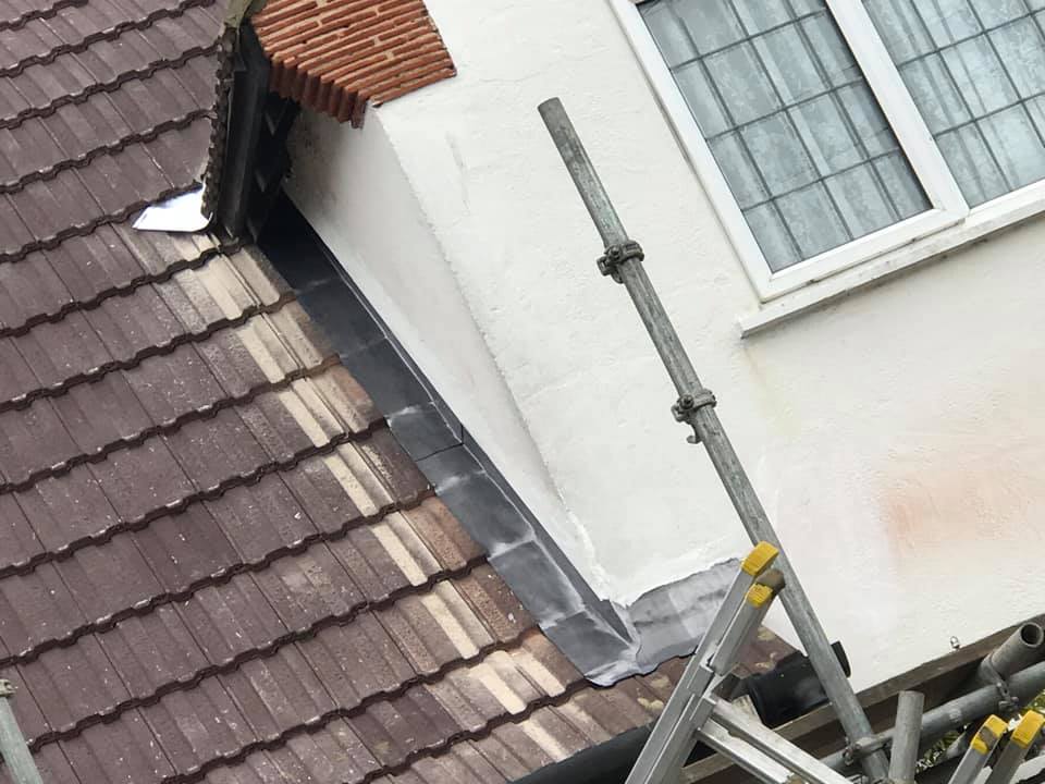 Professional roofers working on a property in London - KS Roof Master