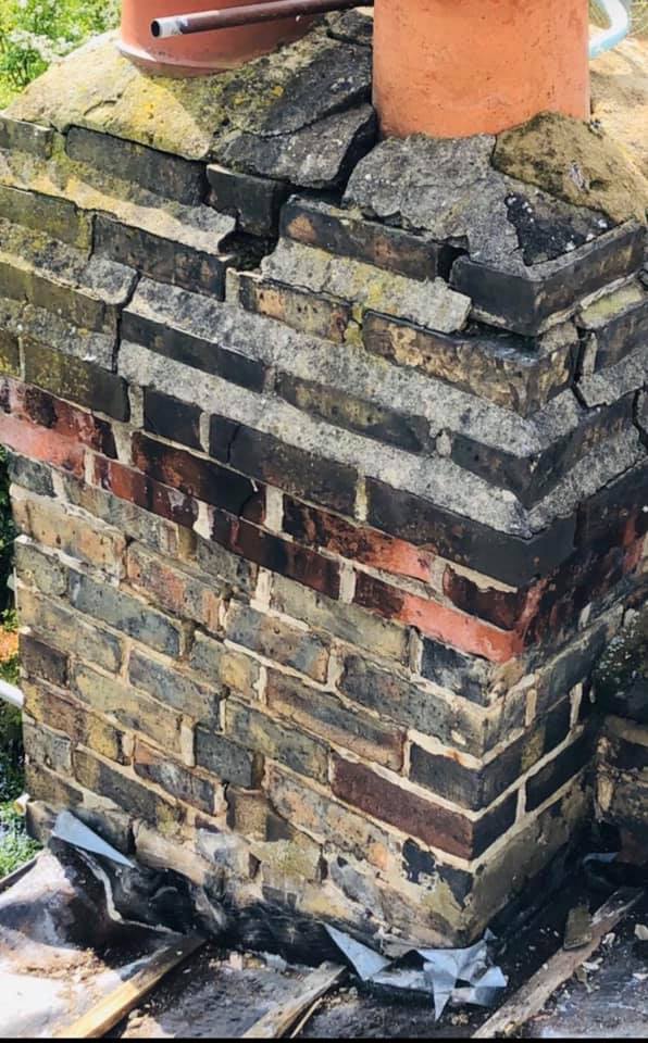Professional roofers working on a property in London - KS Roof Master