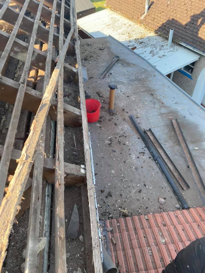 Professional roofers working on a property in London - KS Roof Master