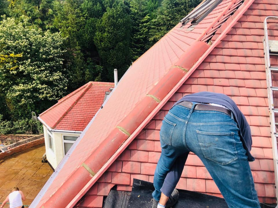 Professional roofers working on a property in London - KS Roof Master