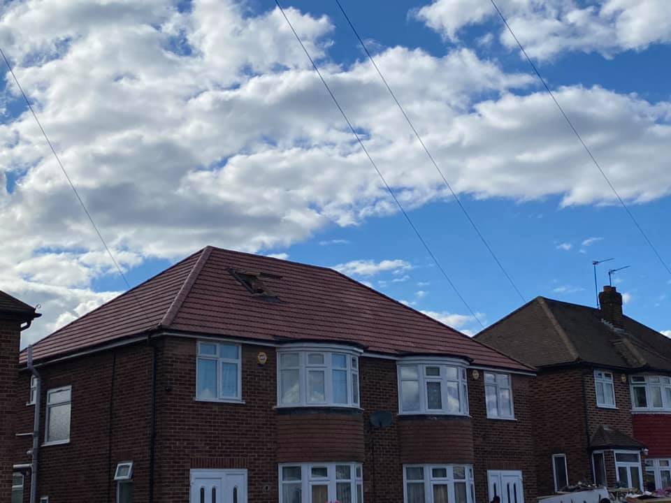 Professional roofers working on a property in London - KS Roof Master