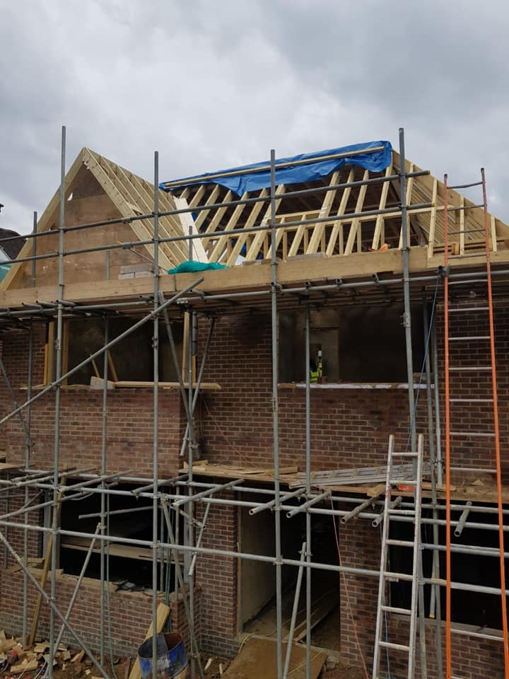 Professional roofers working on a property in London - KS Roof Master