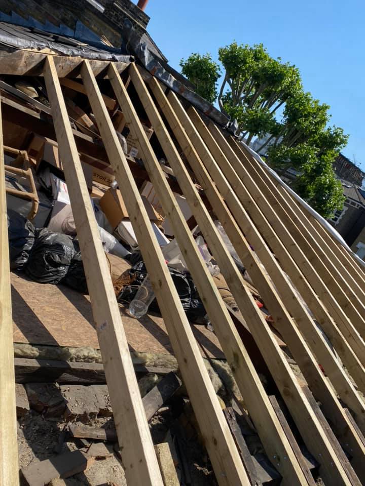 Professional roofers working on a property in London - KS Roof Master