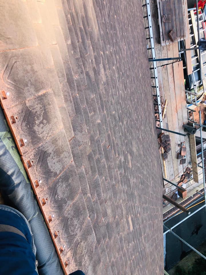 Professional roofers working on a property in London - KS Roof Master