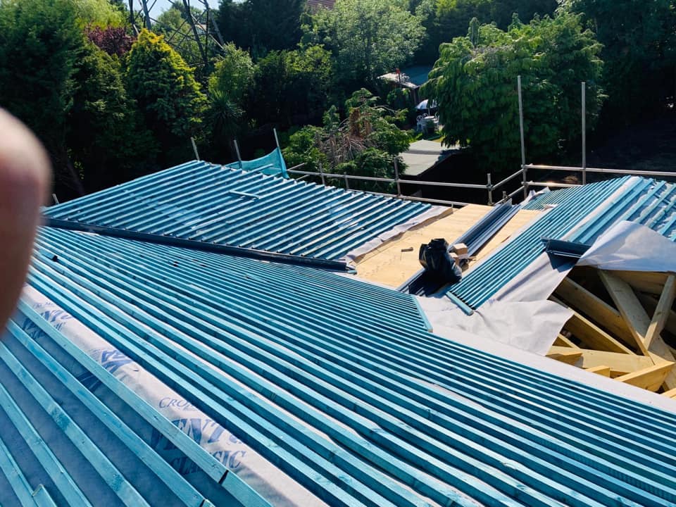 Professional roofers working on a property in London - KS Roof Master