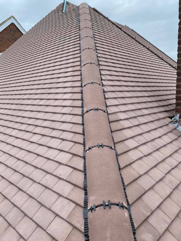 Professional roofers working on a property in London - KS Roof Master