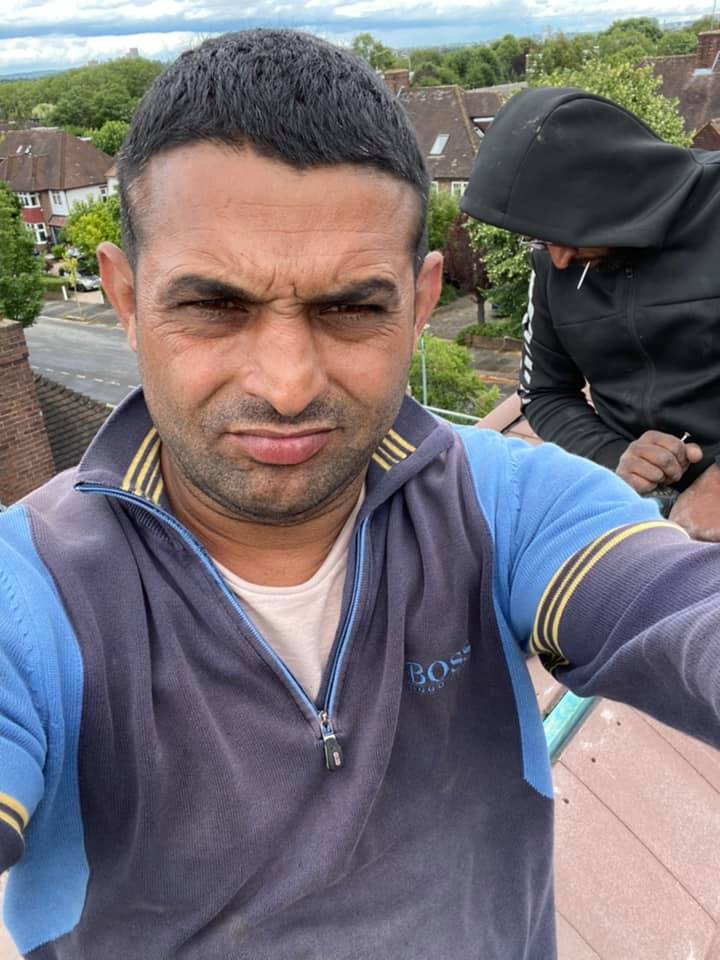 Professional roofers working on a property in London - KS Roof Master