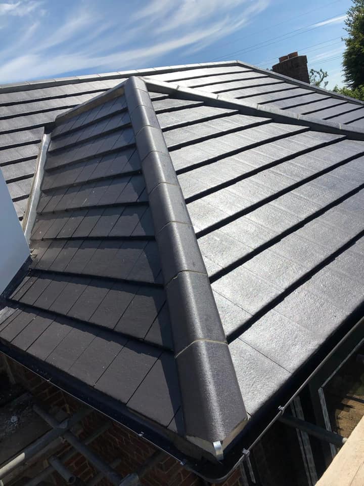Professional roofers working on a property in London - KS Roof Master