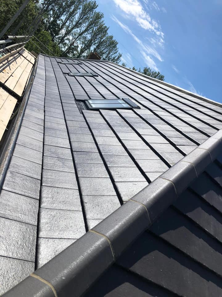 Professional roofers working on a property in London - KS Roof Master