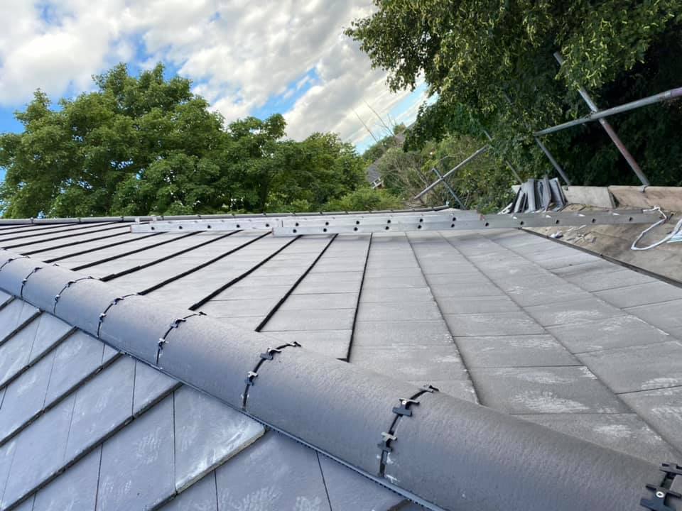 Professional roofers working on a property in London - KS Roof Master