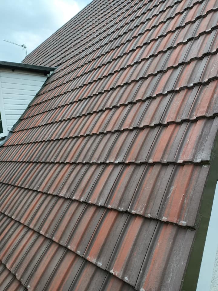 Professional roofers working on a property in London - KS Roof Master