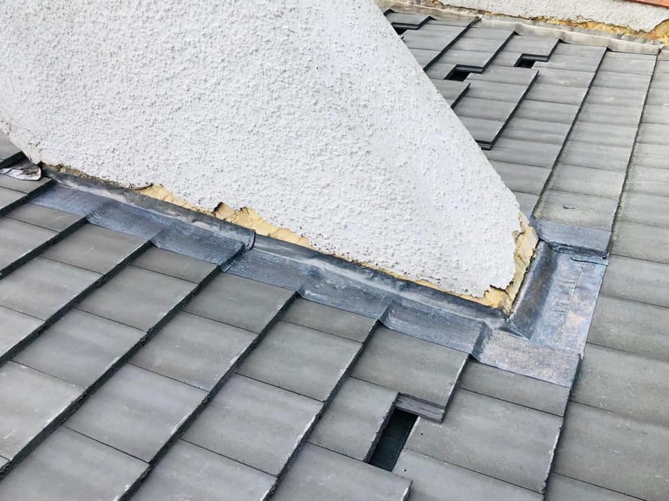 Professional roofers working on a property in London - KS Roof Master