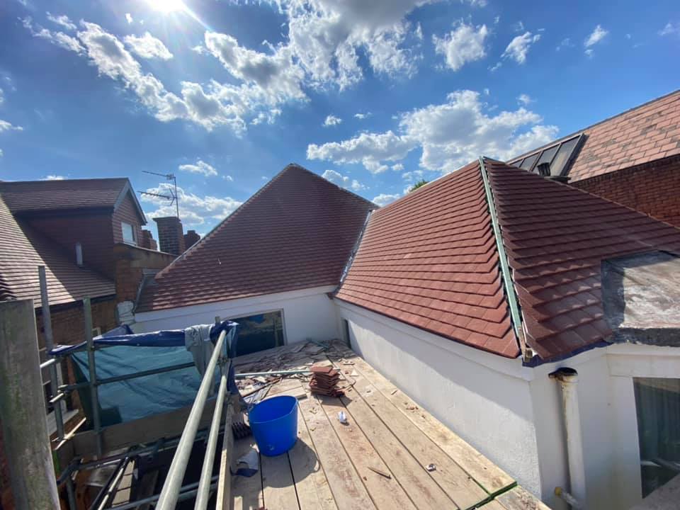 Professional roofers working on a property in London - KS Roof Master