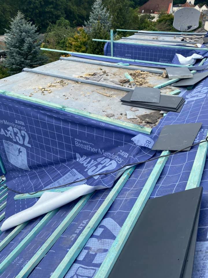 Professional roofers working on a property in London - KS Roof Master