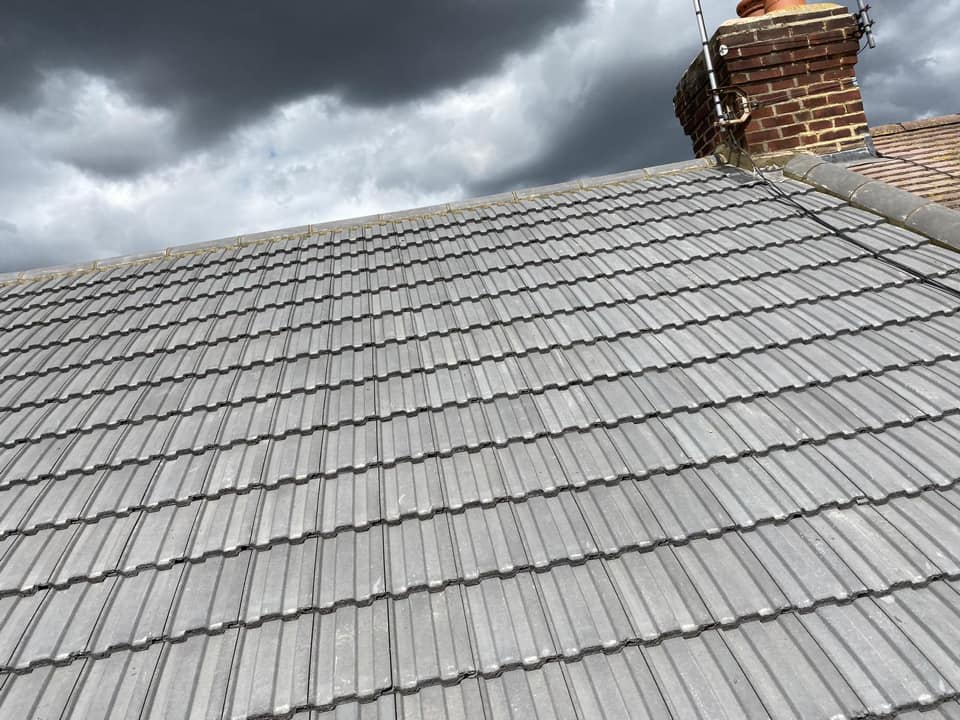 Professional roofers working on a property in London - KS Roof Master