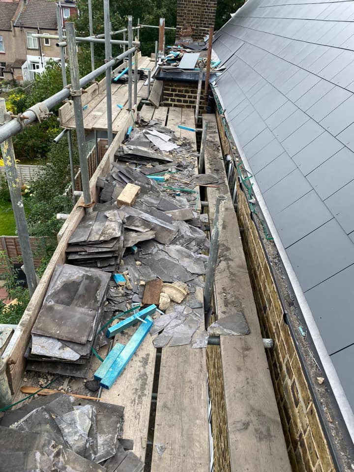 Professional roofers working on a property in London - KS Roof Master