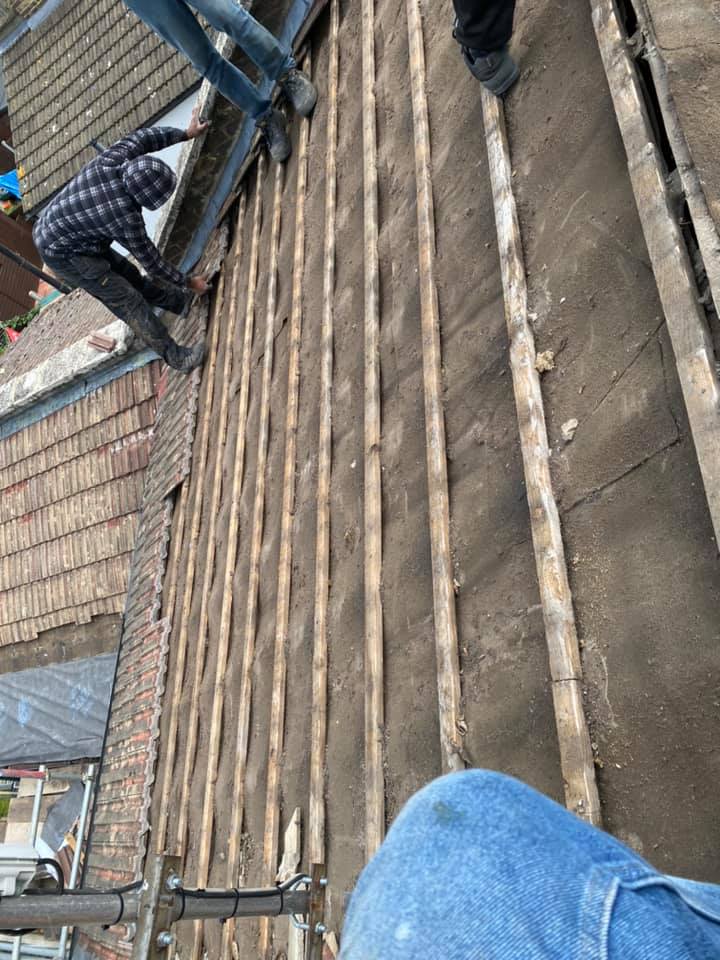 Professional roofers working on a property in London - KS Roof Master