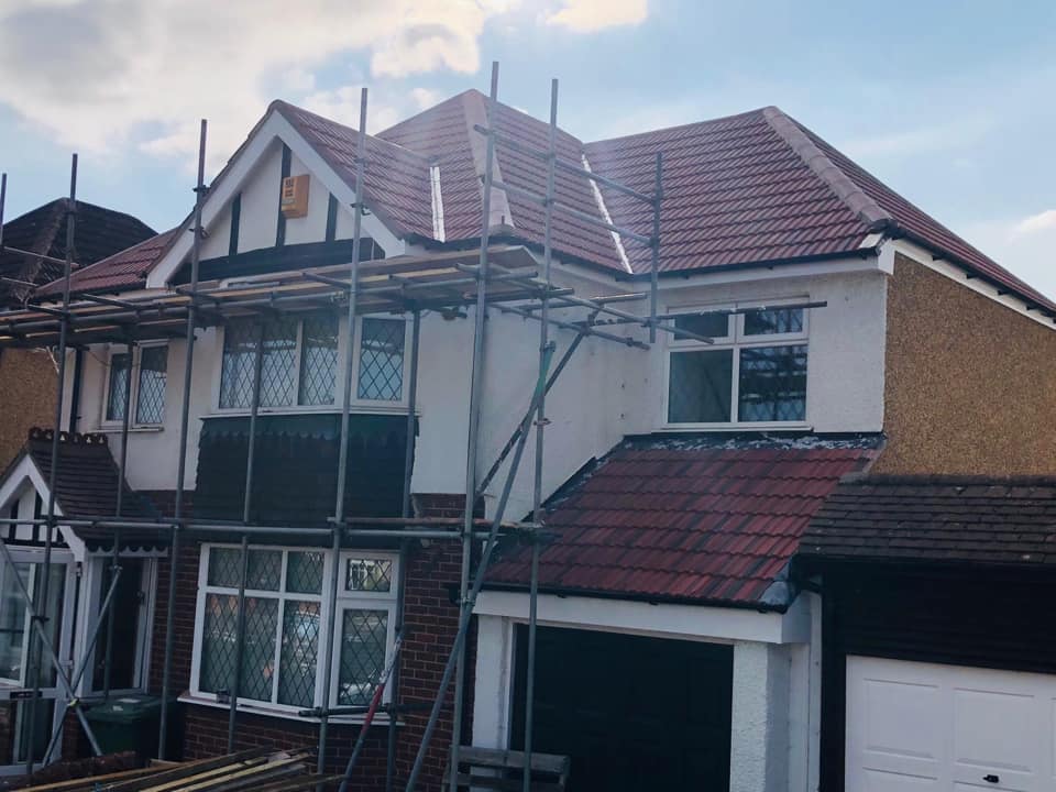 Professional roofers working on a property in London - KS Roof Master