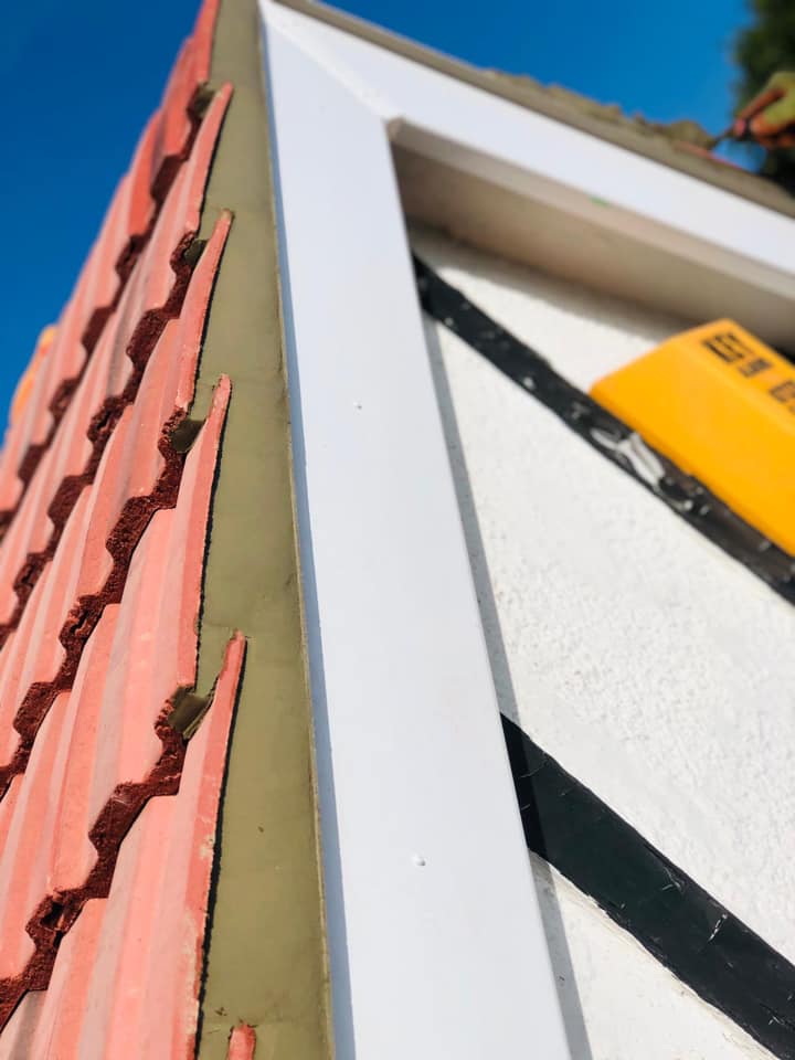 Professional roofers working on a property in London - KS Roof Master