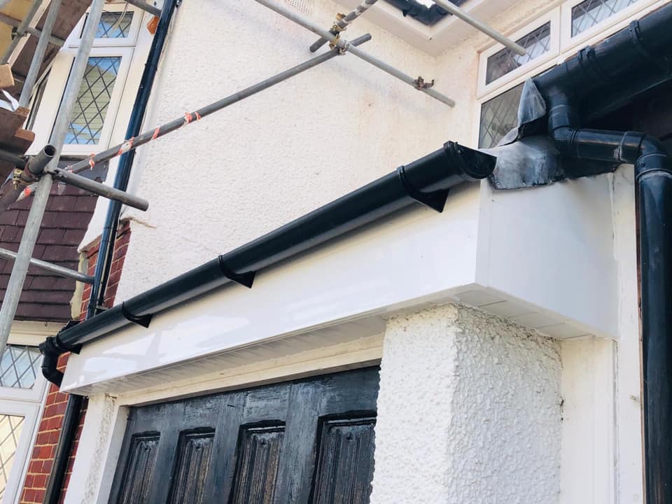 Professional roofers working on a property in London - KS Roof Master
