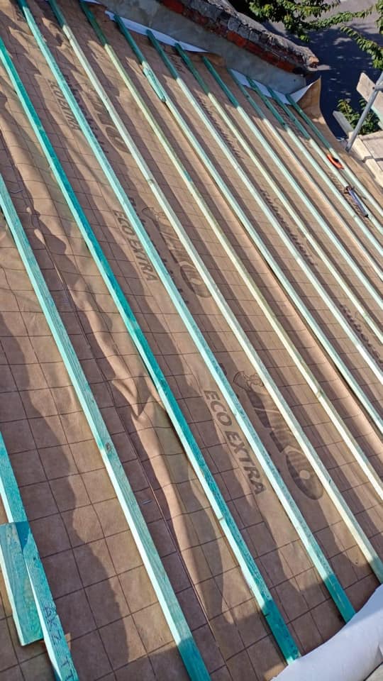 Professional roofers working on a property in London - KS Roof Master