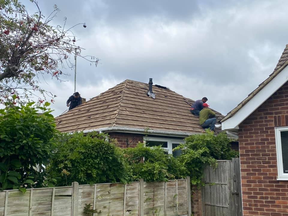 Professional roofers working on a property in London - KS Roof Master