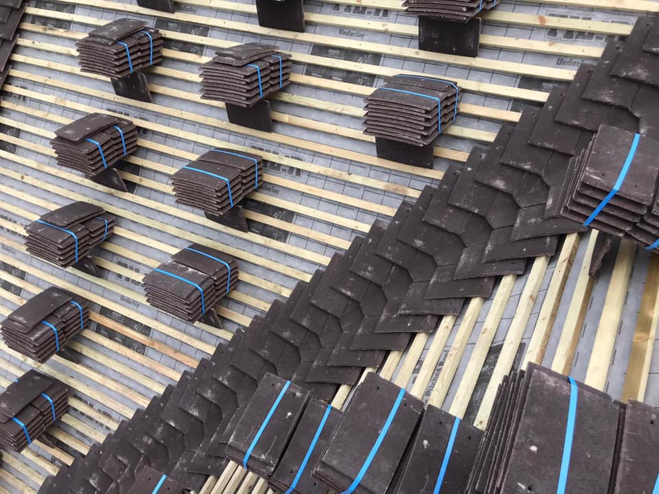 Professional roofers working on a property in London - KS Roof Master