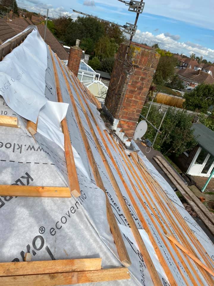 Professional roofers working on a property in London - KS Roof Master