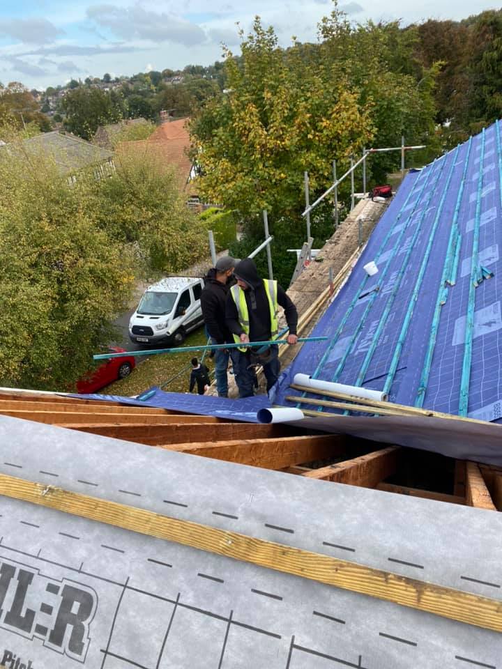 Professional roofers working on a property in London - KS Roof Master