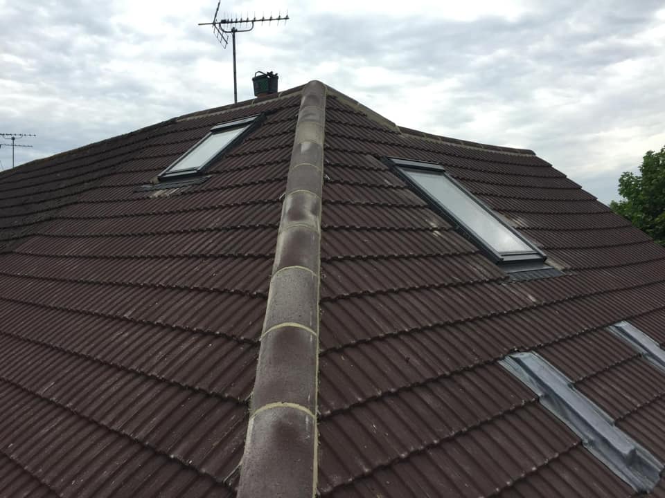 Professional roofers working on a property in London - KS Roof Master