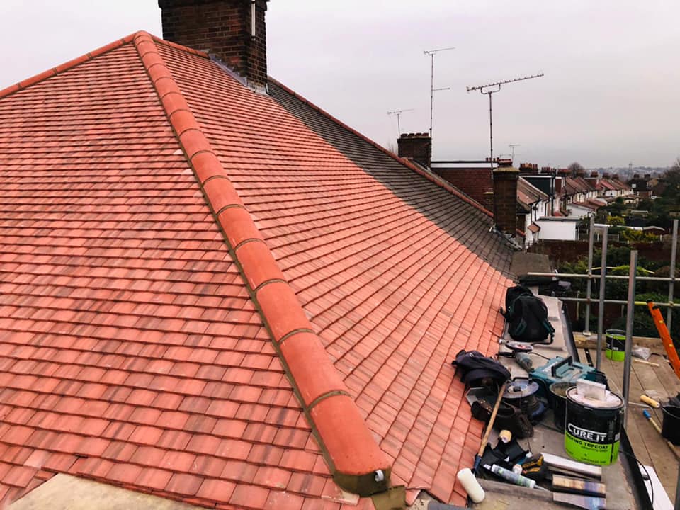 Professional roofers working on a property in London - KS Roof Master