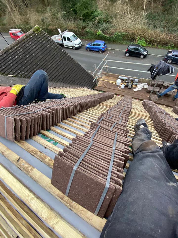 Professional roofers working on a property in London - KS Roof Master
