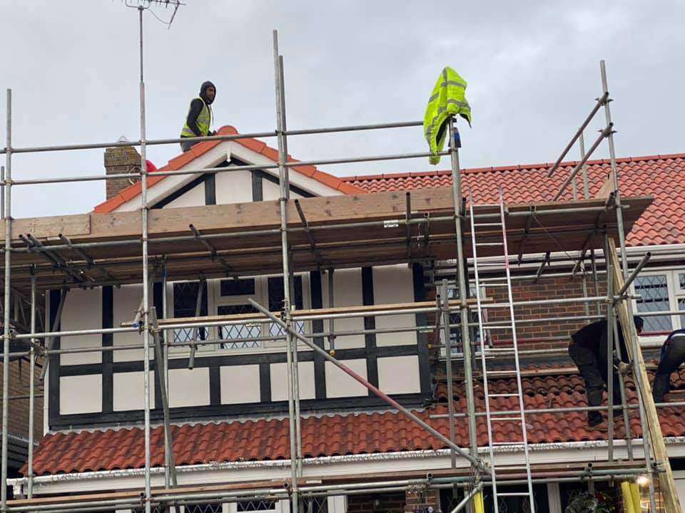 Professional roofers working on a property in London - KS Roof Master