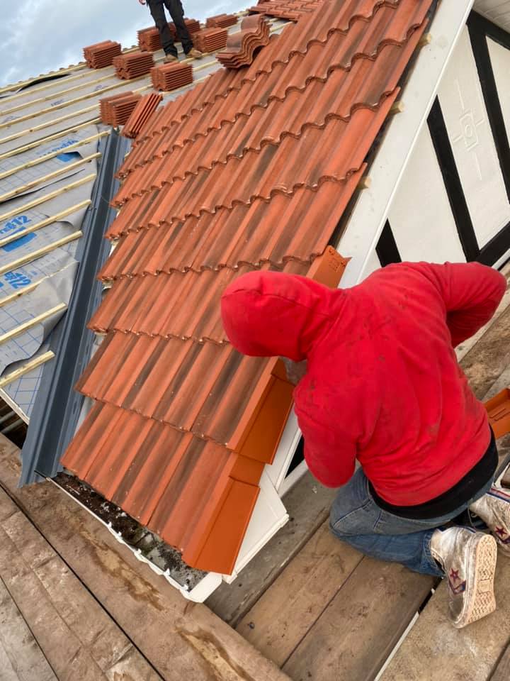 Professional roofers working on a property in London - KS Roof Master