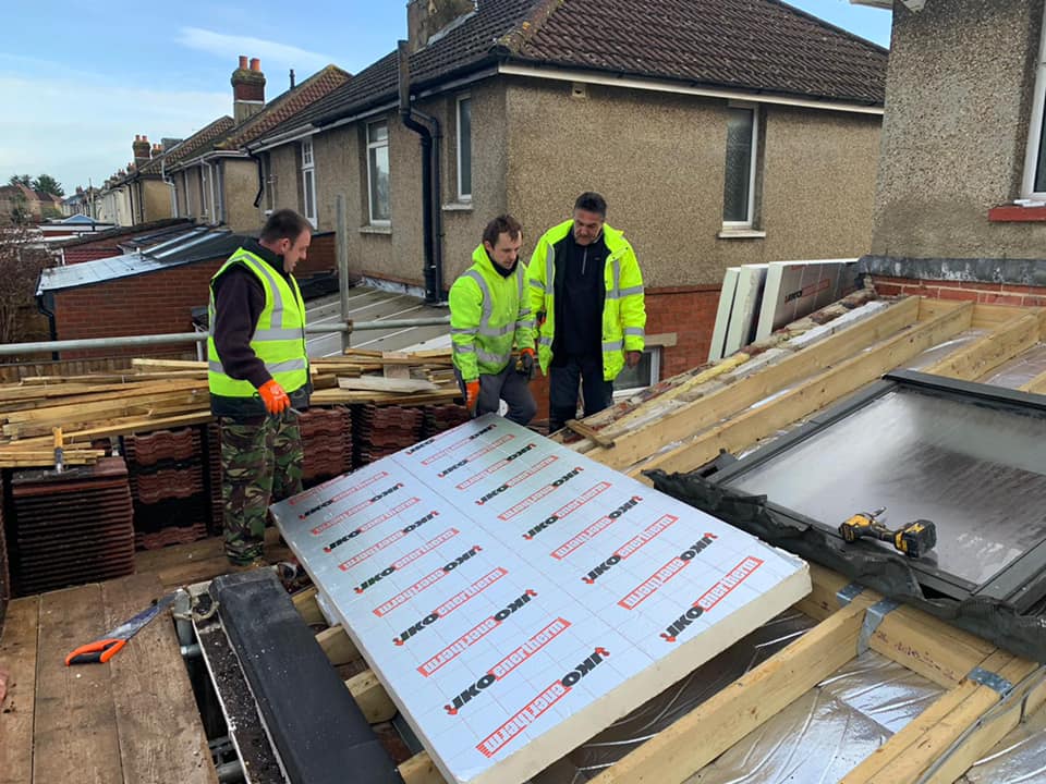Professional roofers working on a property in London - KS Roof Master