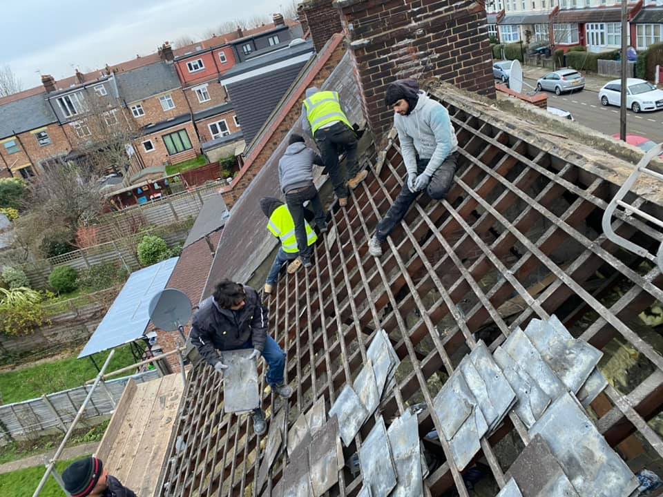 Professional roofers working on a property in London - KS Roof Master