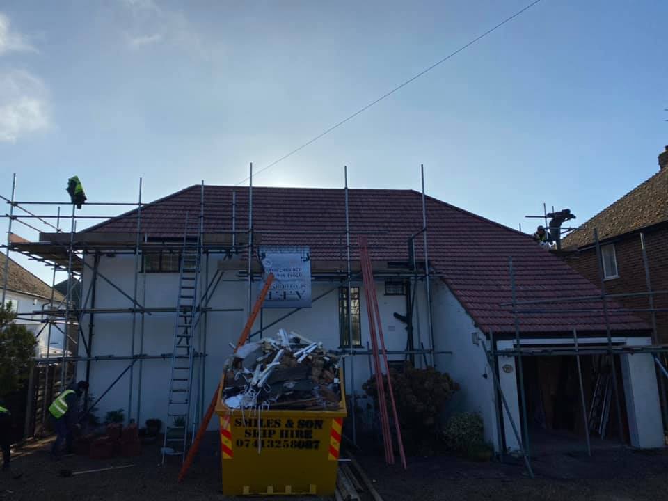 Professional roofers working on a property in London - KS Roof Master