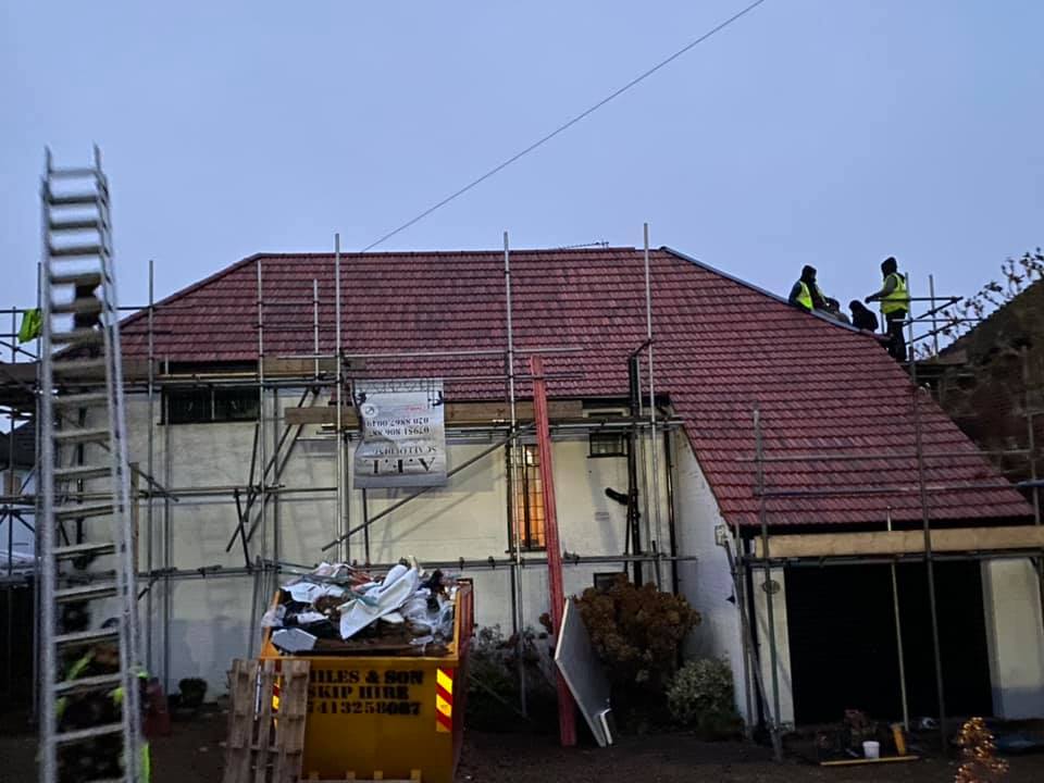 Professional roofers working on a property in London - KS Roof Master