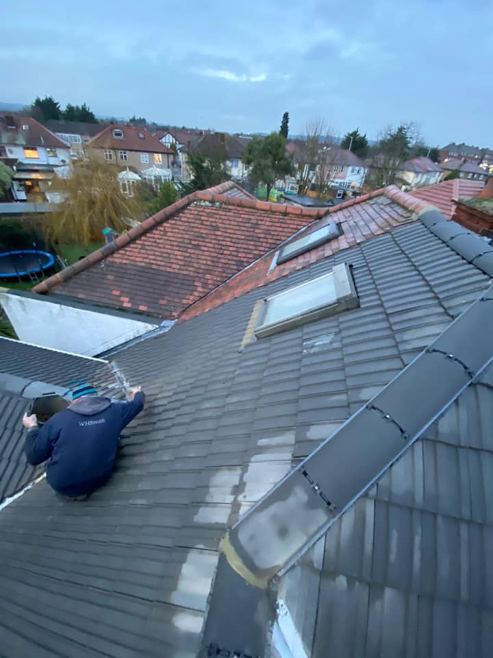 Professional roofers working on a property in London - KS Roof Master